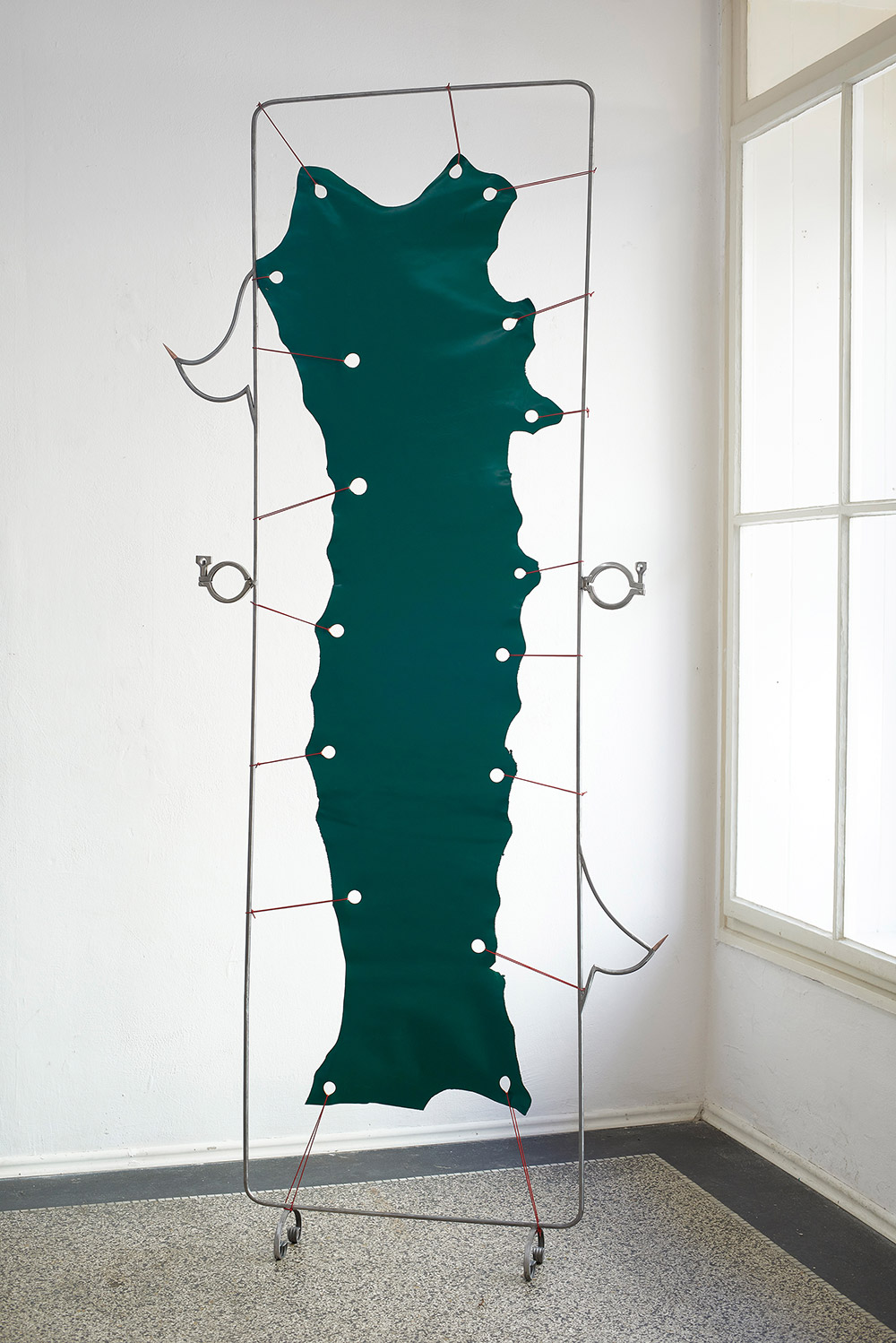 Romana Drdova, Untouchable, 2021, metallic construction, leather, chromed hook, dimension 180x50cm