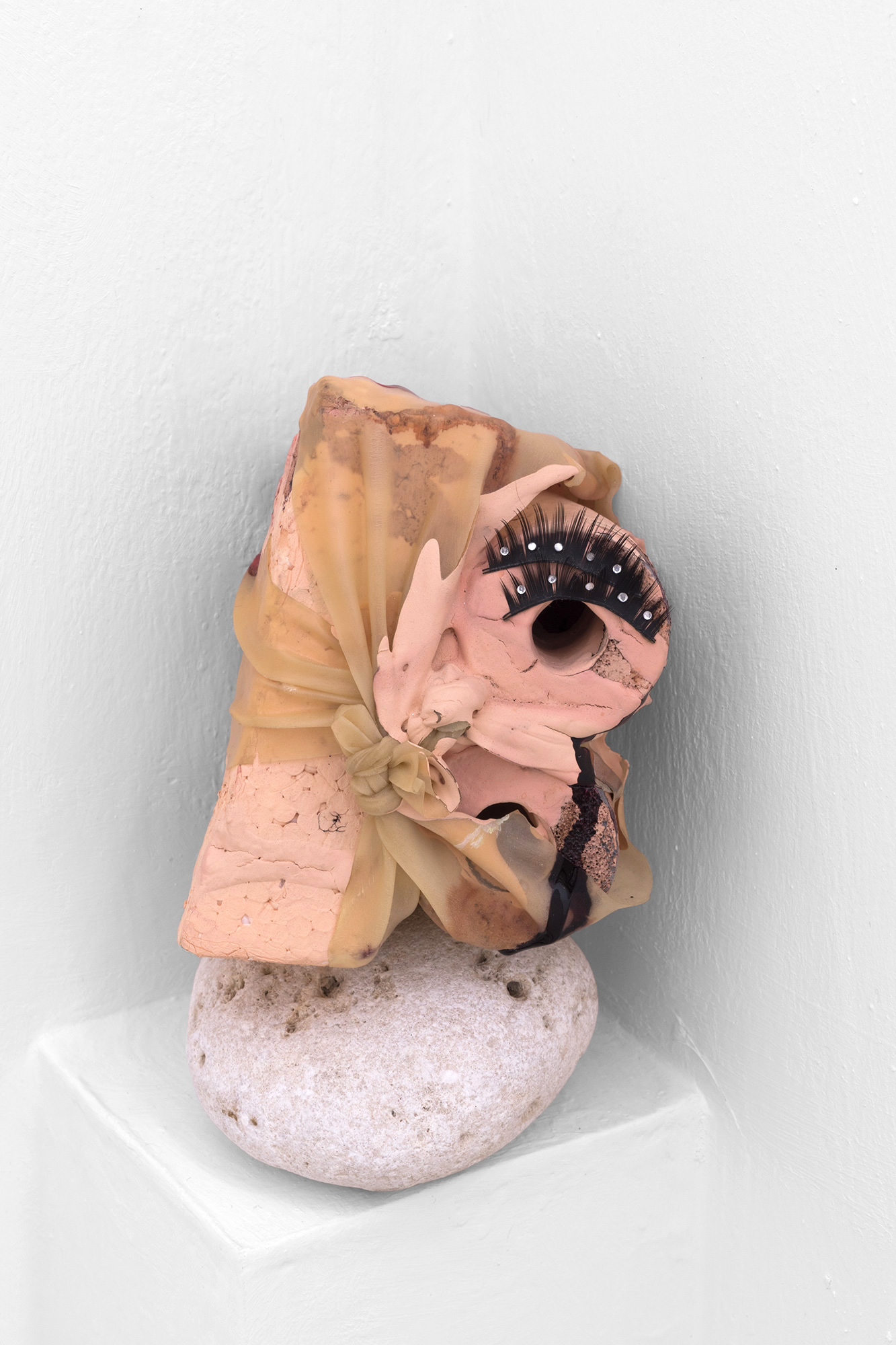 Julia Colavita, New Flesh Miniature (eyes), 2016, polystyrene foam, latex, acrylic paint, false lashes, stone 14 x 10 cm